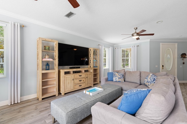 240 Honeysuckle Dr, Jupiter, FL 33458 - living room featuring ceiling fan, light wood-type flooring, and ornamental molding