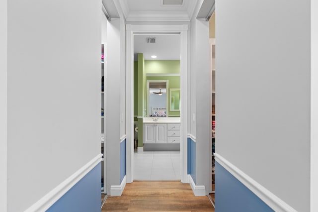 240 Honeysuckle Dr, Jupiter, FL 33458 - hallway featuring crown molding and wood finished floors