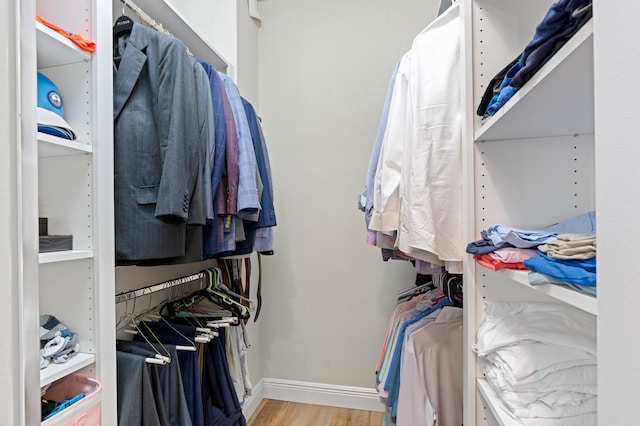 240 Honeysuckle Dr, Jupiter, FL 33458 - spacious closet featuring wood finished floors