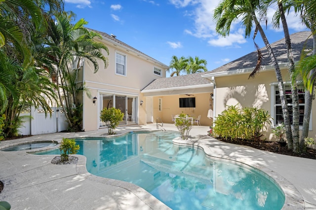 240 Honeysuckle Dr, Jupiter, FL 33458 - outdoor pool with an in-ground hot tub and a patio area