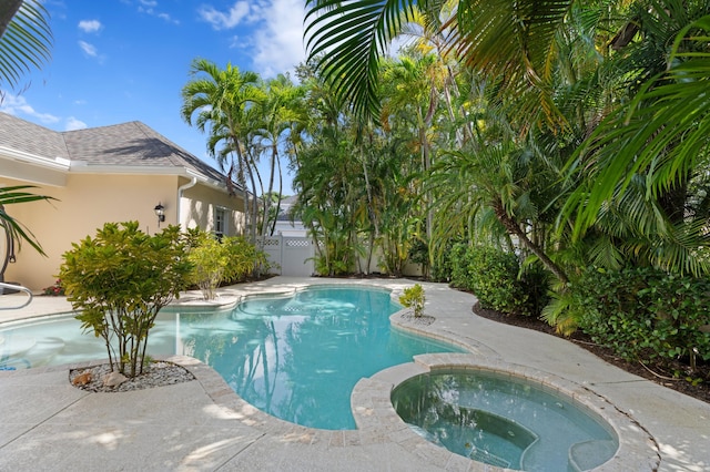 240 Honeysuckle Dr, Jupiter, FL 33458 - view of pool featuring a pool with connected hot tub
