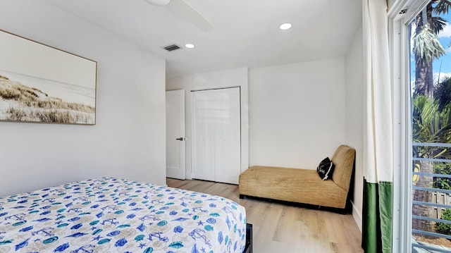 218 NE 10th St, Delray Beach, FL 33444 - bedroom with light wood finished floors, recessed lighting, ceiling fan, and a closet