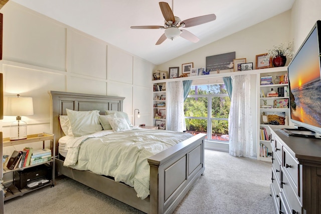 352 NW Granville St, Port Saint Lucie, FL 34986 - bedroom with light carpet, vaulted ceiling, and a ceiling fan