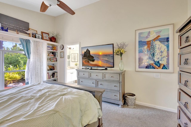 352 NW Granville St, Port Saint Lucie, FL 34986 - carpeted bedroom with ensuite bathroom and a ceiling fan