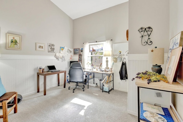 352 NW Granville St, Port Saint Lucie, FL 34986 - office with high vaulted ceiling, wainscoting, and carpet flooring