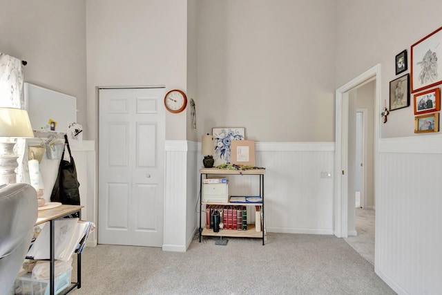 352 NW Granville St, Port Saint Lucie, FL 34986 - carpeted office featuring wainscoting and a towering ceiling