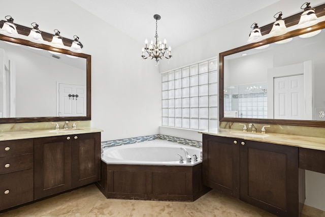 7117 Treviso Ln, Boynton Beach, FL 33472 - full bath featuring two vanities, a garden tub, a chandelier, and a shower