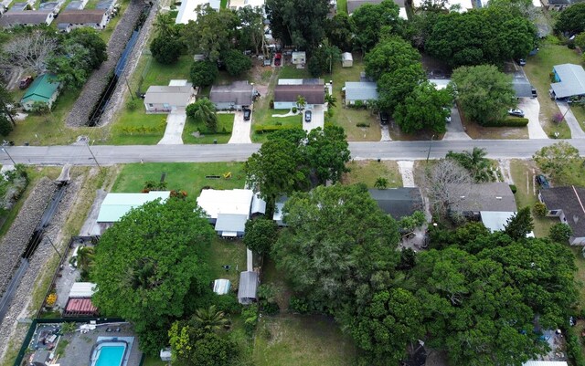 706 Azalea Ave, Fort Pierce, FL 34982 - aerial view of property and surrounding area featuring nearby suburban area