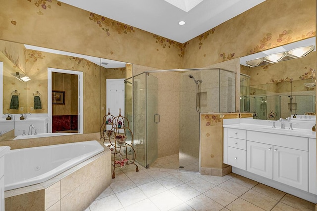 6496 San Michel Way, Delray Beach, FL 33484 - bathroom featuring a tub with jets, vanity, a shower stall, a skylight, and tile patterned flooring