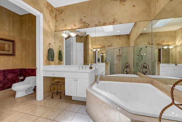 6496 San Michel Way, Delray Beach, FL 33484 - full bathroom featuring wallpapered walls, a shower stall, a jetted tub, a skylight, and vanity