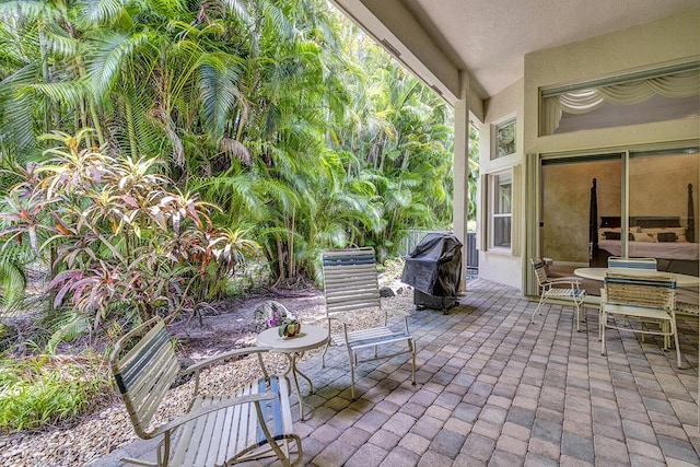 6496 San Michel Way, Delray Beach, FL 33484 - view of patio featuring a grill