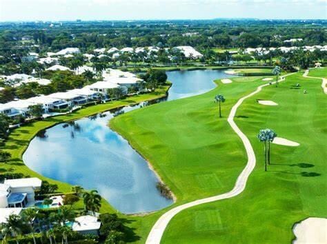 6496 San Michel Way, Delray Beach, FL 33484 - bird's eye view of a large body of water and a golf club