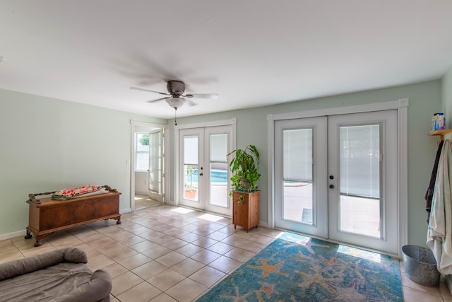 12069 Easterly Ave, Palm Beach Gardens, FL 33410 - doorway with french doors, light tile patterned flooring, and ceiling fan