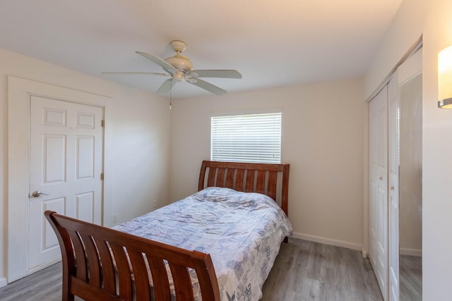 12069 Easterly Ave, Palm Beach Gardens, FL 33410 - bedroom featuring light wood-style floors, a closet, and ceiling fan