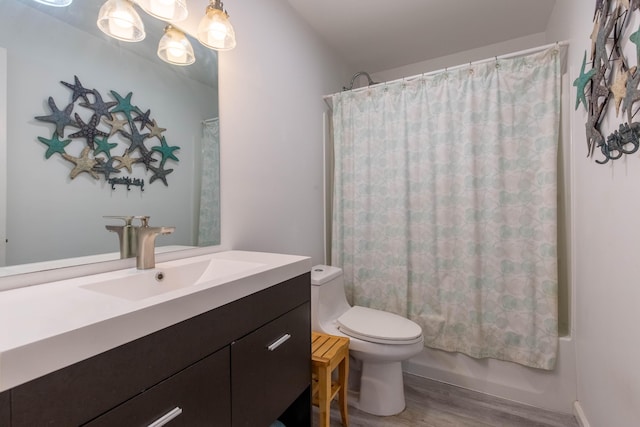 12069 Easterly Ave, Palm Beach Gardens, FL 33410 - full bathroom with wood finished floors, vanity, and shower / tub combo