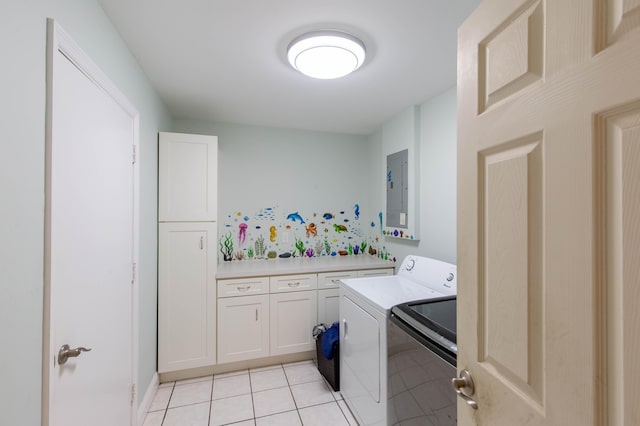 12069 Easterly Ave, Palm Beach Gardens, FL 33410 - laundry room with washer and dryer, cabinet space, electric panel, and light tile patterned floors
