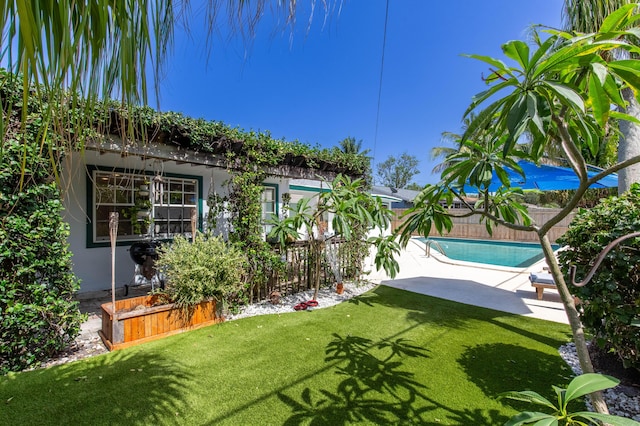 12069 Easterly Ave, Palm Beach Gardens, FL 33410 - fenced backyard with a patio