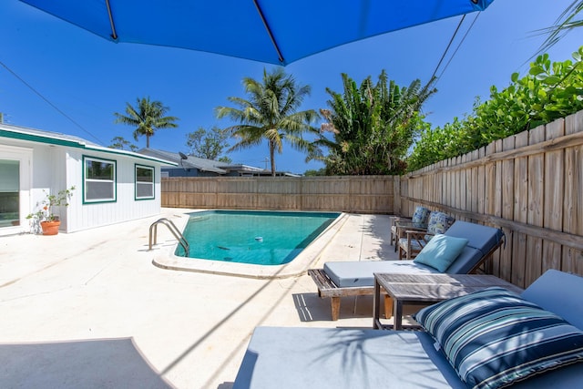 12069 Easterly Ave, Palm Beach Gardens, FL 33410 - view of pool with a patio area and a fenced backyard