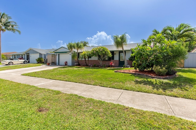 12069 Easterly Ave, Palm Beach Gardens, FL 33410 - ranch-style home with concrete driveway and an attached garage