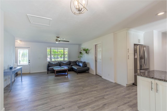 12069 Easterly Ave, Palm Beach Gardens, FL 33410 - living room with light wood finished floors and attic access