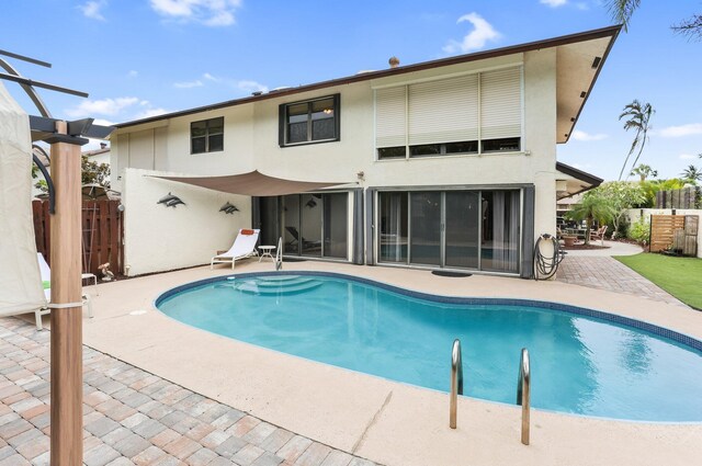 368 SW 29th Ave, Delray Beach, FL 33445 - kitchen with appliances with stainless steel finishes, tasteful backsplash, light stone countertops, and light brown cabinetry