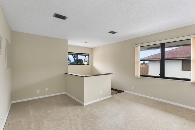 368 SW 29th Ave, Delray Beach, FL 33445 - spare room featuring carpet floors, ceiling fan, and a textured ceiling