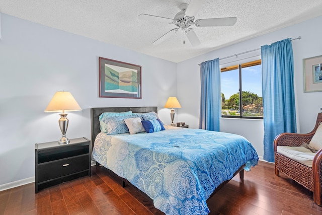 10263 N Circle Lake Dr Unit 201, Boynton Beach, FL 33437 - bedroom featuring hardwood / wood-style floors, a textured ceiling, and ceiling fan
