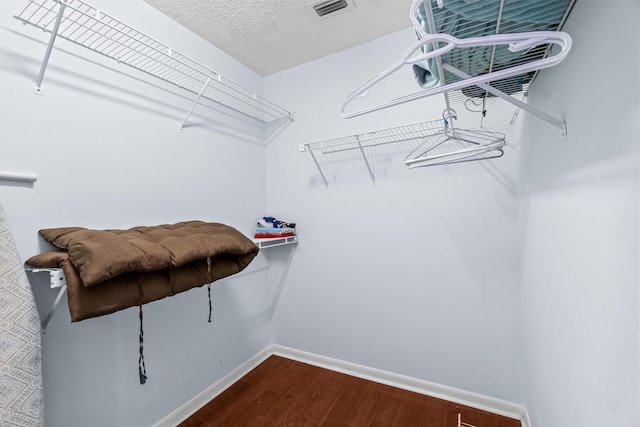 10263 N Circle Lake Dr Unit 201, Boynton Beach, FL 33437 - spacious closet featuring dark wood finished floors