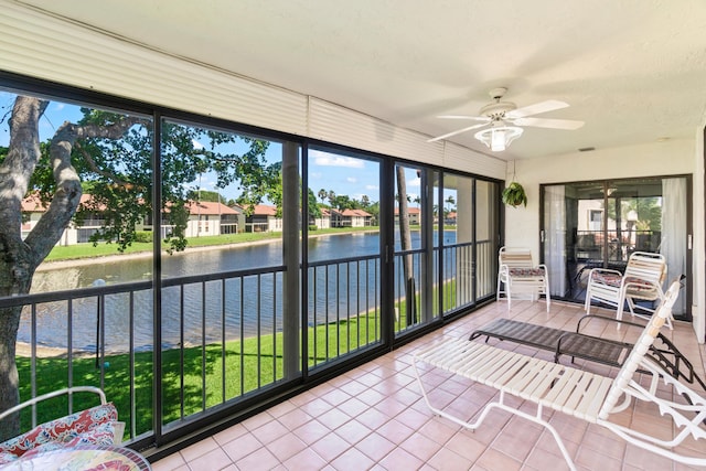 10263 N Circle Lake Dr Unit 201, Boynton Beach, FL 33437 - sunroom featuring a water view and ceiling fan