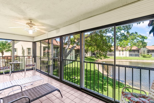 10263 N Circle Lake Dr Unit 201, Boynton Beach, FL 33437 - unfurnished sunroom with a water view and ceiling fan