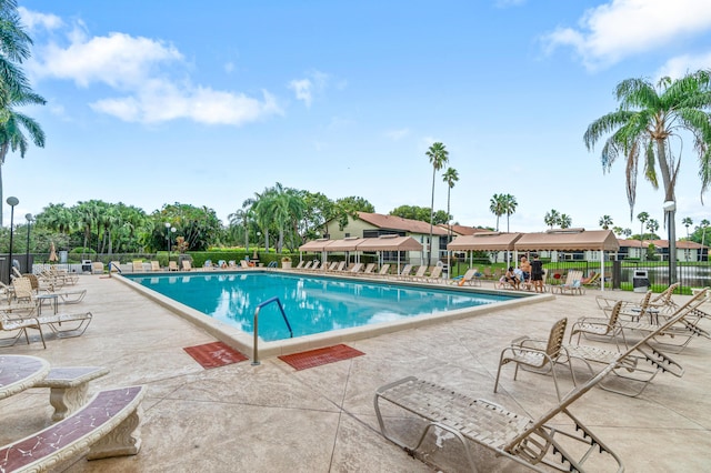 10263 N Circle Lake Dr Unit 201, Boynton Beach, FL 33437 - community pool featuring a patio
