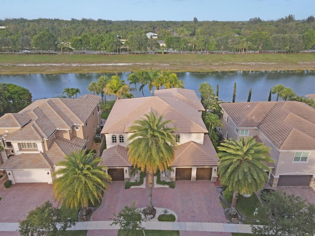 718 Edgebrook Ln, West Palm Beach, FL 33411 - aerial view of property and surrounding area featuring a large body of water and a heavily wooded area