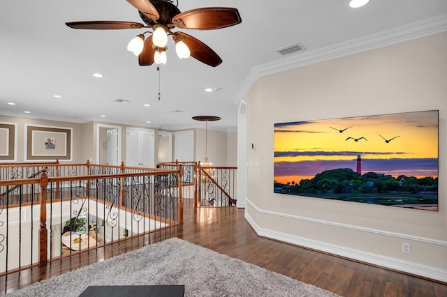 718 Edgebrook Ln, West Palm Beach, FL 33411 - hall with ornamental molding, an upstairs landing, wood finished floors, and recessed lighting