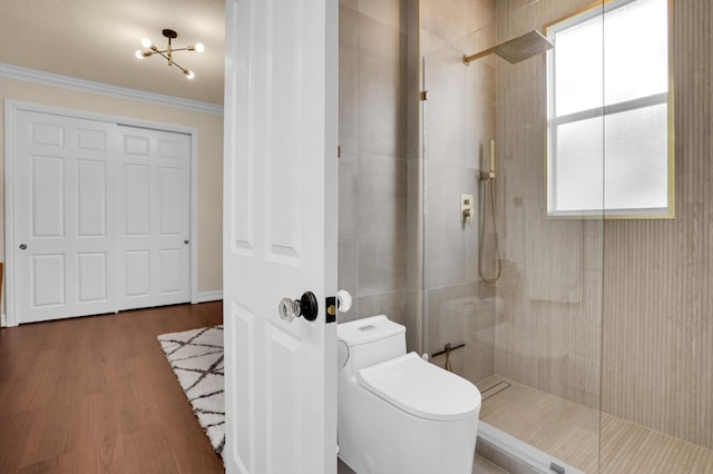 718 Edgebrook Ln, West Palm Beach, FL 33411 - bathroom with a walk in shower, ornamental molding, and wood finished floors