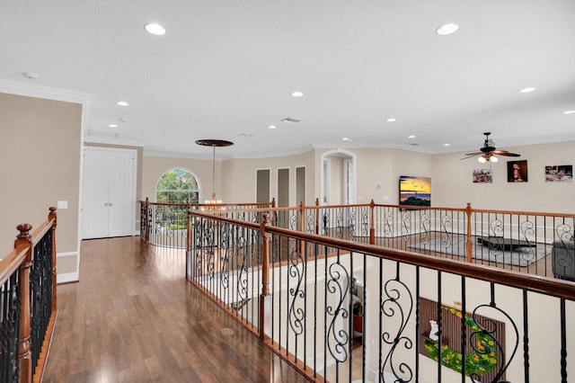 718 Edgebrook Ln, West Palm Beach, FL 33411 - hallway with recessed lighting, wood finished floors, ornamental molding, and an upstairs landing