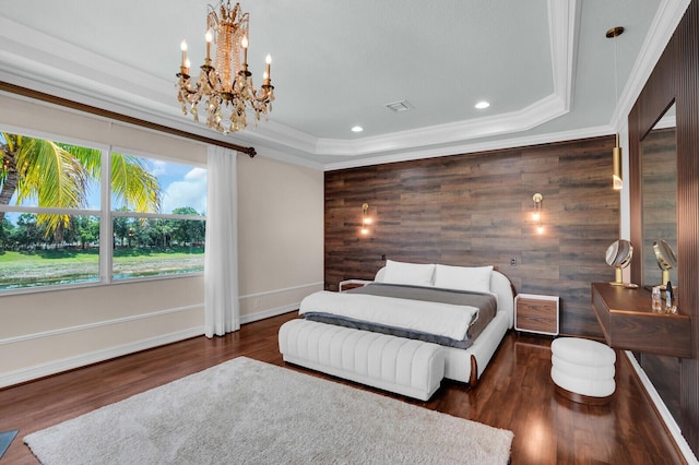 718 Edgebrook Ln, West Palm Beach, FL 33411 - bedroom with a chandelier, a tray ceiling, wood finished floors, recessed lighting, and ornamental molding