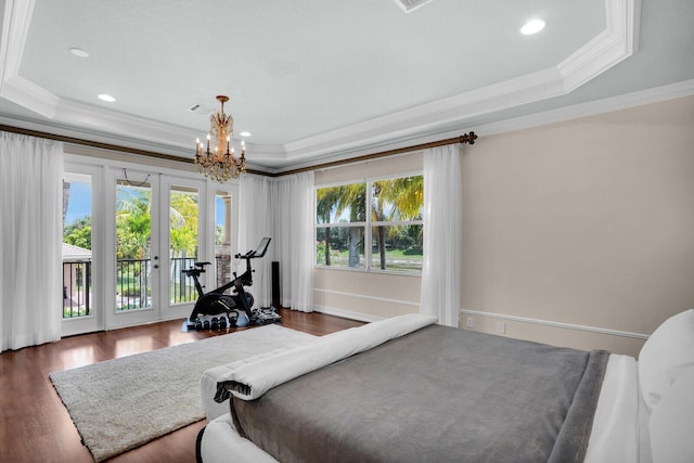 718 Edgebrook Ln, West Palm Beach, FL 33411 - bedroom with a tray ceiling, access to exterior, ornamental molding, multiple windows, and a chandelier