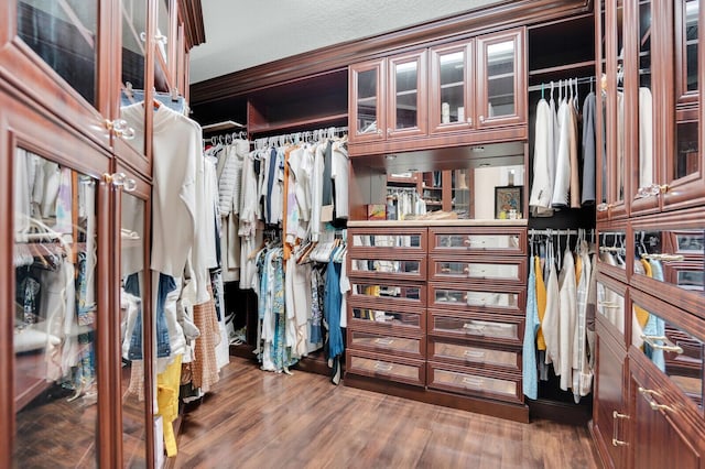 718 Edgebrook Ln, West Palm Beach, FL 33411 - walk in closet featuring wood finished floors