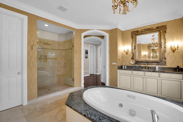 718 Edgebrook Ln, West Palm Beach, FL 33411 - bathroom featuring a stall shower, a jetted tub, a chandelier, vanity, and crown molding