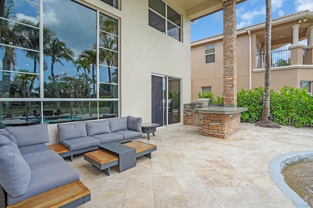 718 Edgebrook Ln, West Palm Beach, FL 33411 - view of patio / terrace featuring outdoor lounge area and exterior kitchen