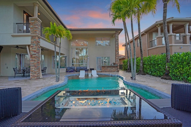 718 Edgebrook Ln, West Palm Beach, FL 33411 - swimming pool with a ceiling fan, a patio area, an in-ground hot tub, and an outdoor living space