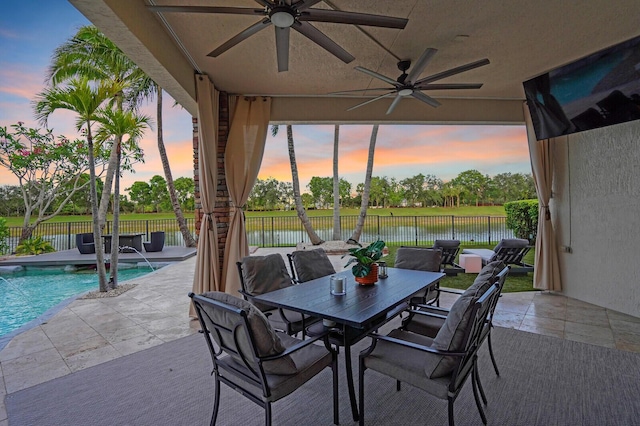 718 Edgebrook Ln, West Palm Beach, FL 33411 - fenced backyard featuring a ceiling fan, a patio, and outdoor dining area