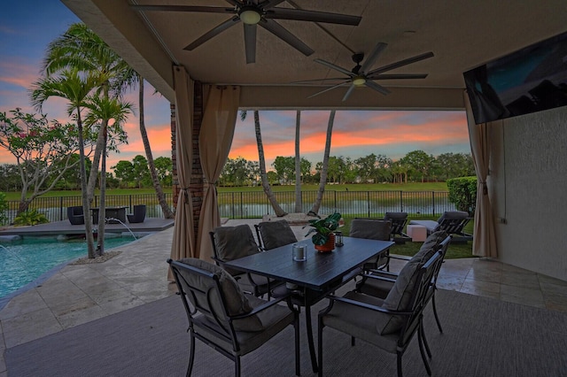 718 Edgebrook Ln, West Palm Beach, FL 33411 - fenced backyard featuring ceiling fan, a patio area, and outdoor dining space