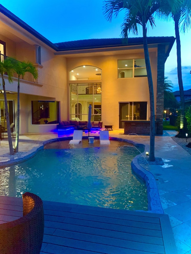 718 Edgebrook Ln, West Palm Beach, FL 33411 - swimming pool with a jacuzzi and a patio