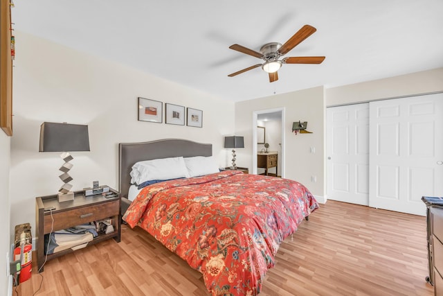 182 Charter Way, West Palm Beach, FL 33407 - bedroom with light wood finished floors, a closet, and a ceiling fan