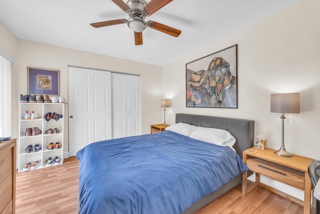 182 Charter Way, West Palm Beach, FL 33407 - bedroom featuring wood finished floors, a closet, and a ceiling fan