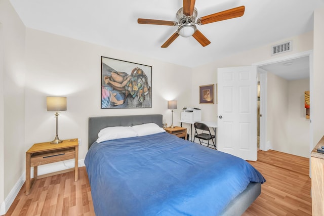 182 Charter Way, West Palm Beach, FL 33407 - bedroom featuring light wood-type flooring and a ceiling fan