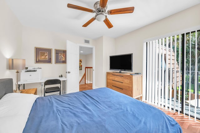 182 Charter Way, West Palm Beach, FL 33407 - bedroom with access to exterior and a ceiling fan