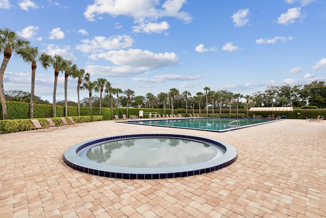 182 Charter Way, West Palm Beach, FL 33407 - community pool featuring a patio