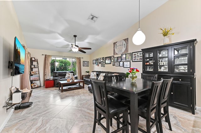8404 Long Bay, West Palm Beach, FL 33411 - dining room with light marble finish floors, ceiling fan, and lofted ceiling